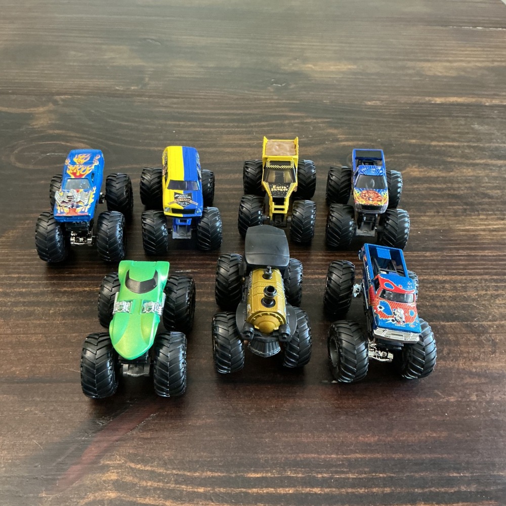 Hot Wheels Monster Trucks Lot of 7 Loco Punk Earth Shaker Bounty Hunter 1:64